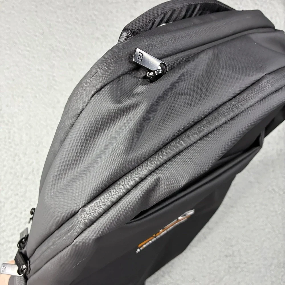 TravisMathew Backpack Black Laptop Travel Bag QISG Quanta Services Logo NWT